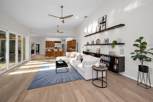 4962 Turtle Creek Trl, Oldsmar, FL 34677 - living area featuring light wood-type flooring, ceiling fan, recessed lighting, and baseboards