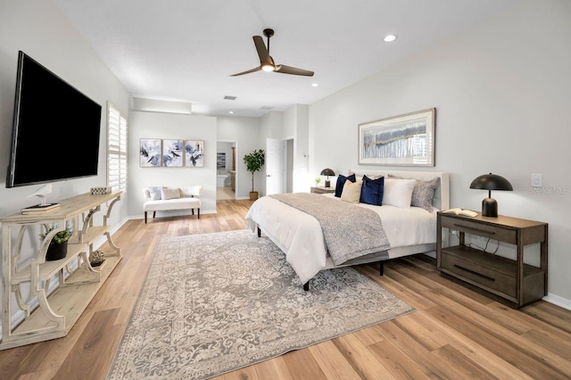 4962 Turtle Creek Trl, Oldsmar, FL 34677 - bedroom with wood finished floors, recessed lighting, a ceiling fan, ensuite bath, and baseboards
