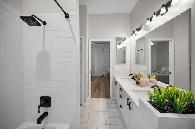 4962 Turtle Creek Trl, Oldsmar, FL 34677 - full bathroom with connected bathroom, double vanity, bathtub / shower combination, and tile patterned flooring