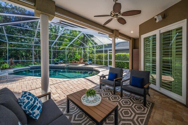 4962 Turtle Creek Trl, Oldsmar, FL 34677 - view of pool featuring a patio, a lanai, a ceiling fan, and a pool with connected hot tub