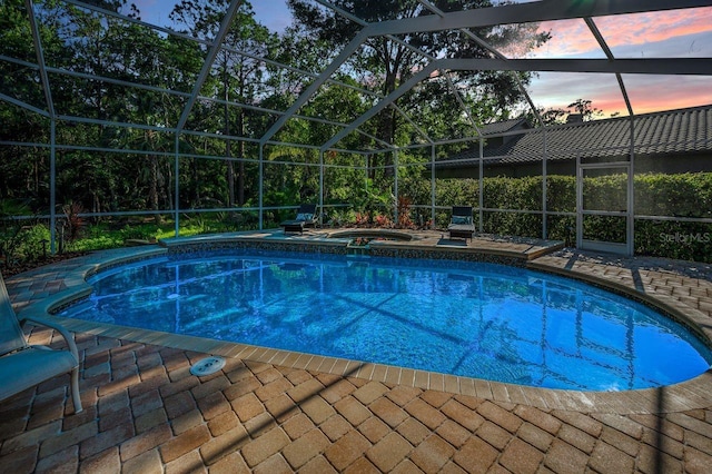 4962 Turtle Creek Trl, Oldsmar, FL 34677 - view of swimming pool featuring glass enclosure and a patio