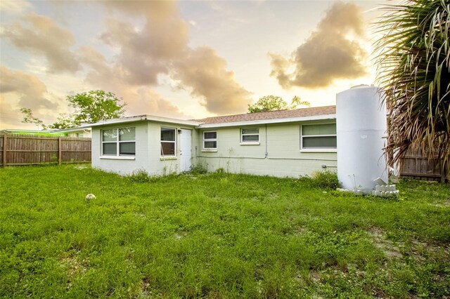 9020 Gray Fox Ln, Port Richey, FL 34668 - back of property with concrete block siding