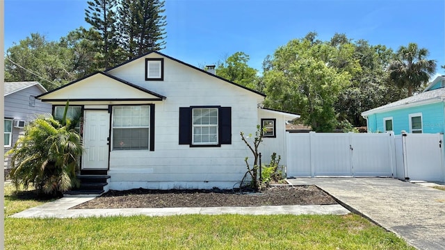 2219 Thrace St, Tampa, FL 33605 - view of front of house featuring a gate and entry steps