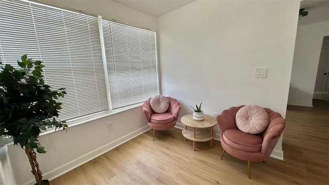2219 Thrace St, Tampa, FL 33605 - sitting room featuring wood finished floors and baseboards