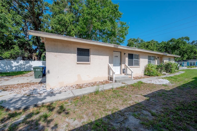 725 2nd Ave NE, Largo, FL 33770 - view of front of property featuring stucco siding