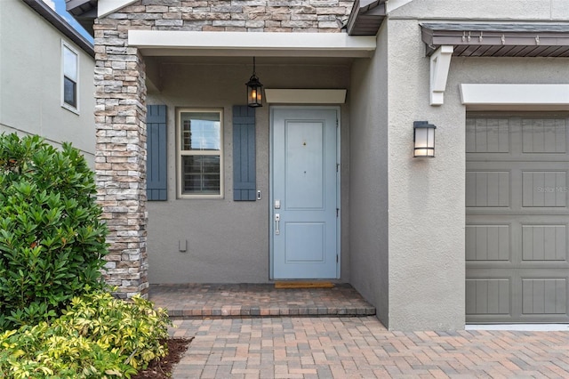 4345 Cadence Loop, Land O Lakes, FL 34638 - entrance to property with stucco siding and stone siding