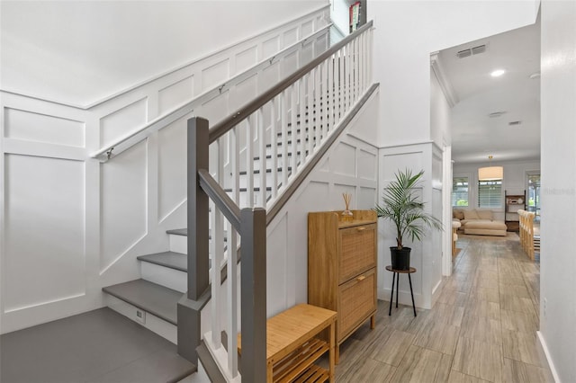 4345 Cadence Loop, Land O Lakes, FL 34638 - staircase with a decorative wall