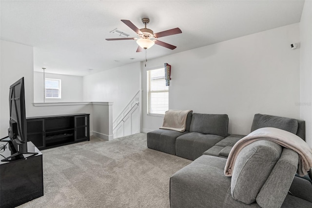 4345 Cadence Loop, Land O Lakes, FL 34638 - living room with carpet flooring, a ceiling fan, and baseboards