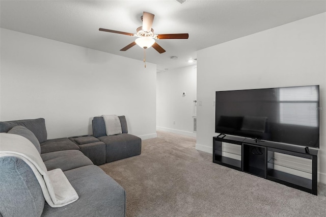 4345 Cadence Loop, Land O Lakes, FL 34638 - carpeted living area with a ceiling fan and baseboards