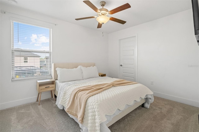 4345 Cadence Loop, Land O Lakes, FL 34638 - carpeted bedroom featuring baseboards and a ceiling fan