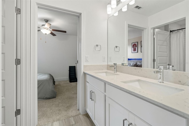 4345 Cadence Loop, Land O Lakes, FL 34638 - full bathroom with ensuite bath, double vanity, and a ceiling fan