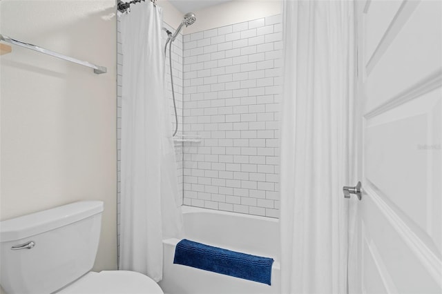 4345 Cadence Loop, Land O Lakes, FL 34638 - bathroom with toilet and shower / bath combo with shower curtain