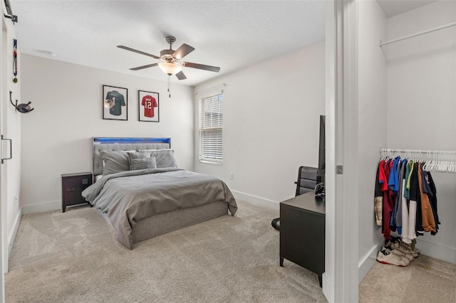4345 Cadence Loop, Land O Lakes, FL 34638 - bedroom featuring carpet flooring, baseboards, and ceiling fan