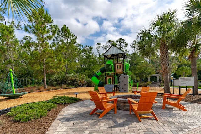 4345 Cadence Loop, Land O Lakes, FL 34638 - view of patio / terrace featuring an outdoor fire pit