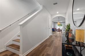 3446 Suncoast Plains Dr, Odessa, FL 33556 - corridor featuring wood finished floors, baseboards, recessed lighting, arched walkways, and stairs