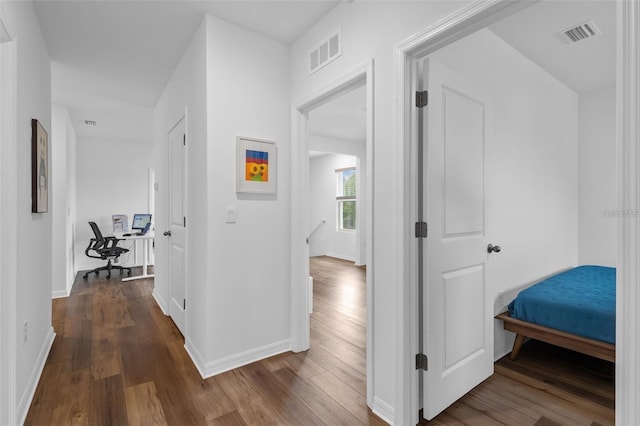3446 Suncoast Plains Dr, Odessa, FL 33556 - hall featuring wood finished floors, an upstairs landing, and baseboards