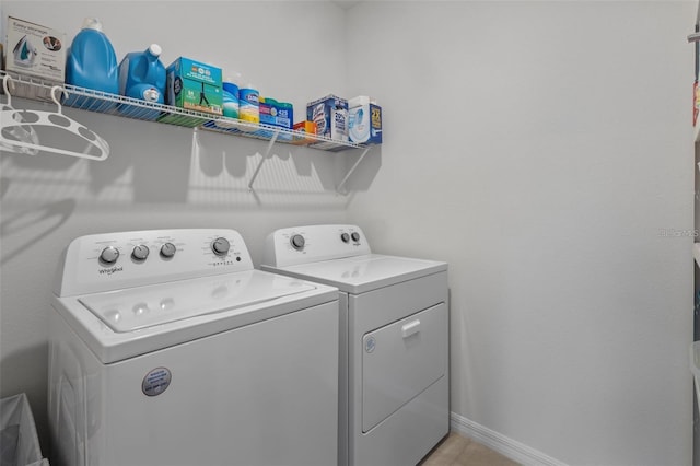 3446 Suncoast Plains Dr, Odessa, FL 33556 - washroom featuring washing machine and dryer and baseboards