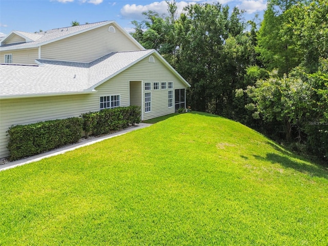 1624 Lullwater Ln, Lutz, FL 33549 - back of property with a lawn and roof with shingles
