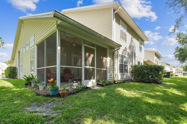 1624 Lullwater Ln, Lutz, FL 33549 - view of property exterior with a sunroom and a yard