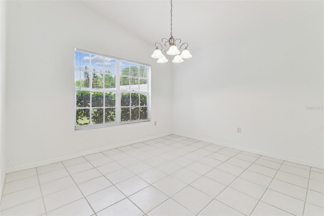 1624 Lullwater Ln, Lutz, FL 33549 - spare room featuring a chandelier, baseboards, vaulted ceiling, and light tile patterned flooring