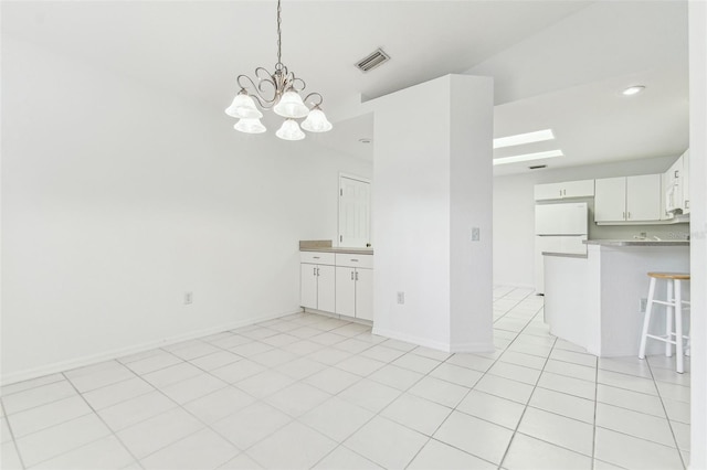 1624 Lullwater Ln, Lutz, FL 33549 - unfurnished dining area with a chandelier, baseboards, recessed lighting, and light tile patterned floors