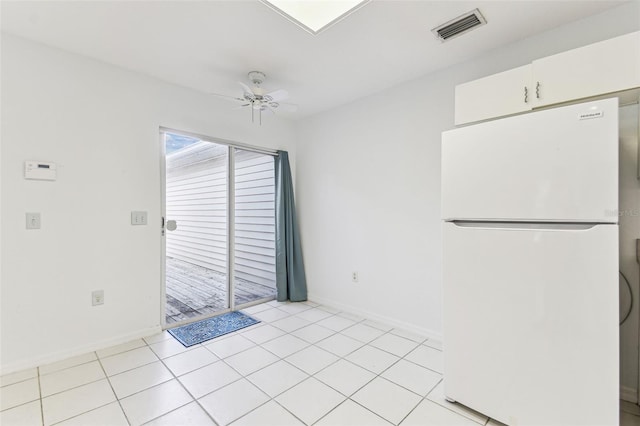 1624 Lullwater Ln, Lutz, FL 33549 - unfurnished dining area featuring a ceiling fan, baseboards, and light tile patterned flooring