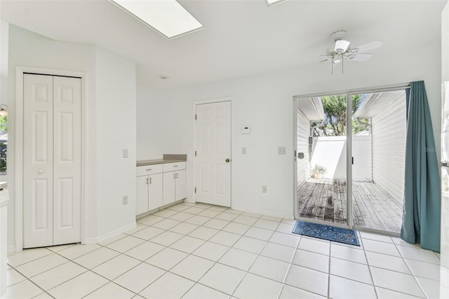 1624 Lullwater Ln, Lutz, FL 33549 - foyer entrance featuring a ceiling fan, light tile patterned floors, and baseboards