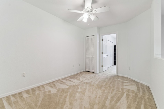 1624 Lullwater Ln, Lutz, FL 33549 - spare room featuring light carpet, baseboards, and a ceiling fan
