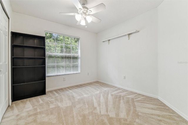 1624 Lullwater Ln, Lutz, FL 33549 - unfurnished bedroom featuring carpet flooring, baseboards, a ceiling fan, and a closet