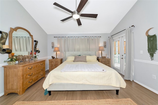 2311 64th Street Ct W, Bradenton, FL 34209 - bedroom featuring lofted ceiling, access to exterior, light wood-style floors, a ceiling fan, and baseboards