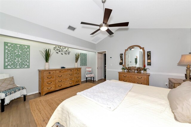 2311 64th Street Ct W, Bradenton, FL 34209 - bedroom featuring wood finished floors, lofted ceiling, and ceiling fan
