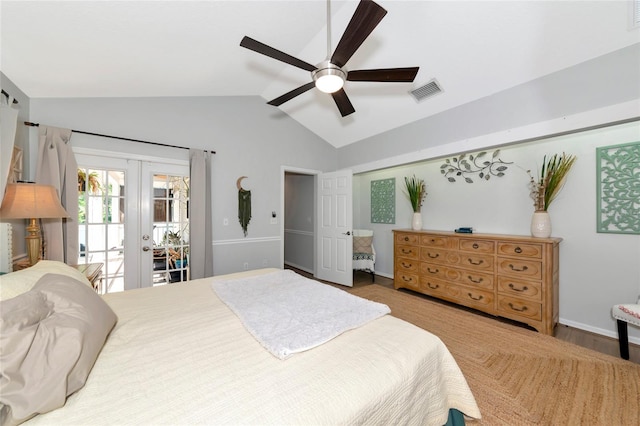 2311 64th Street Ct W, Bradenton, FL 34209 - bedroom featuring french doors, vaulted ceiling, access to outside, a ceiling fan, and wood finished floors