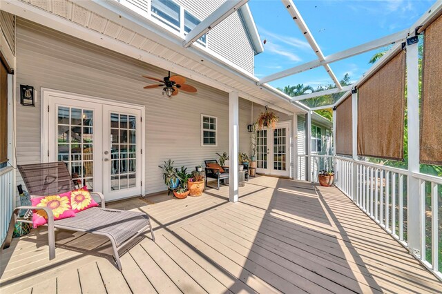 2311 64th Street Ct W, Bradenton, FL 34209 - deck with french doors and a ceiling fan