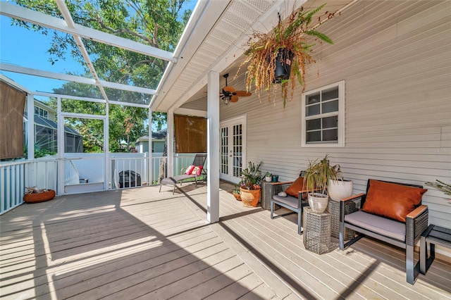 2311 64th Street Ct W, Bradenton, FL 34209 - deck with french doors and a ceiling fan