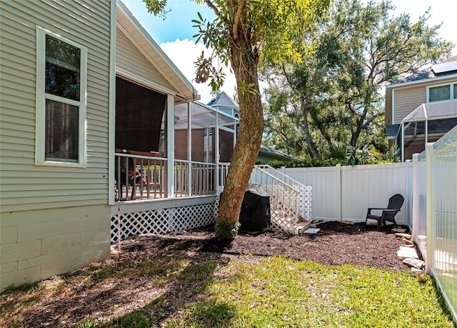 2311 64th Street Ct W, Bradenton, FL 34209 - view of yard with a sunroom