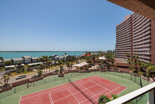 1310 Gulf Blvd Unit 6C, Clearwater Beach, FL 33767 - view of tennis court featuring a water view