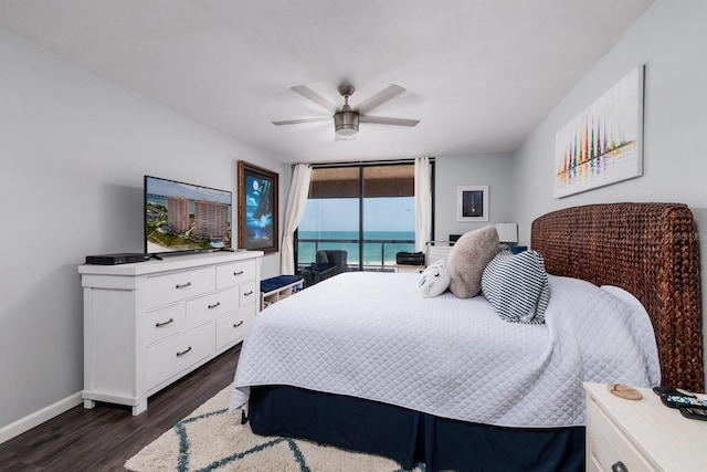 1310 Gulf Blvd Unit 6C, Clearwater Beach, FL 33767 - bedroom featuring access to exterior, dark wood-style flooring, baseboards, and ceiling fan