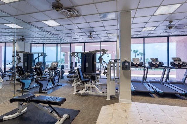 1310 Gulf Blvd Unit 6C, Clearwater Beach, FL 33767 - workout area with expansive windows and tile patterned floors