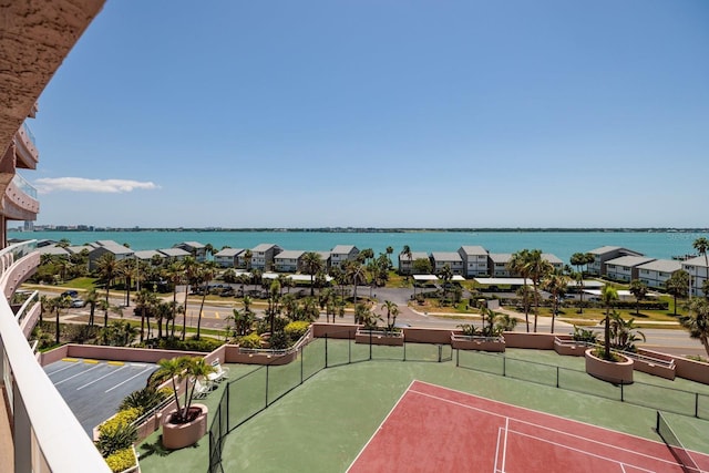 1310 Gulf Blvd Unit 6C, Clearwater Beach, FL 33767 - view of tennis court with a water view