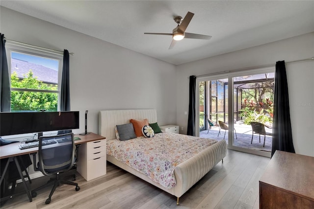 16367 Ashington Park Dr, Tampa, FL 33647 - bedroom with access to exterior, light wood-style floors, and a ceiling fan
