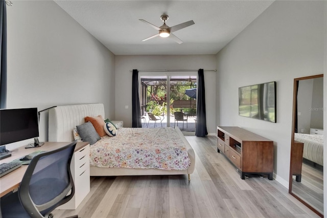 16367 Ashington Park Dr, Tampa, FL 33647 - bedroom with light wood finished floors, a desk, ceiling fan, and baseboards