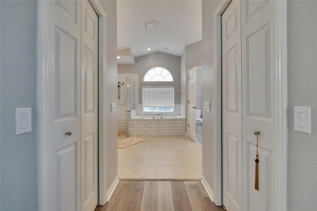 16367 Ashington Park Dr, Tampa, FL 33647 - full bath with a closet, a garden tub, a shower stall, toilet, and vaulted ceiling