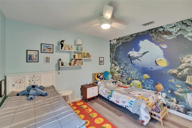 16367 Ashington Park Dr, Tampa, FL 33647 - bedroom featuring wood finished floors, ceiling fan, and baseboards