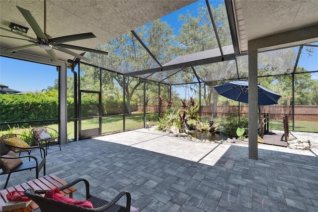 16367 Ashington Park Dr, Tampa, FL 33647 - unfurnished sunroom with ceiling fan