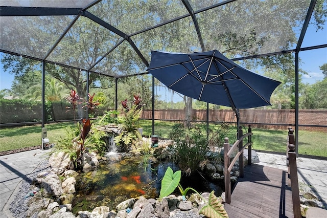 16367 Ashington Park Dr, Tampa, FL 33647 - view of patio / terrace featuring a small pond, a lanai, and a deck