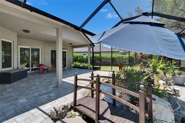 16367 Ashington Park Dr, Tampa, FL 33647 - view of patio / terrace with a lanai