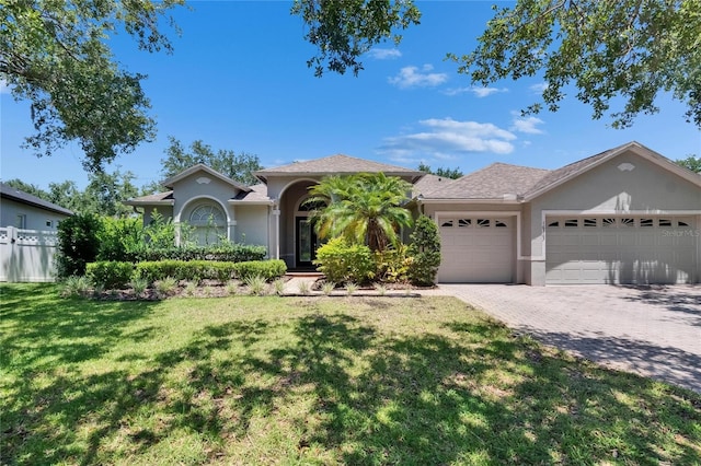 16367 Ashington Park Dr, Tampa, FL 33647 - view of front of home featuring a garage, stucco siding, and driveway