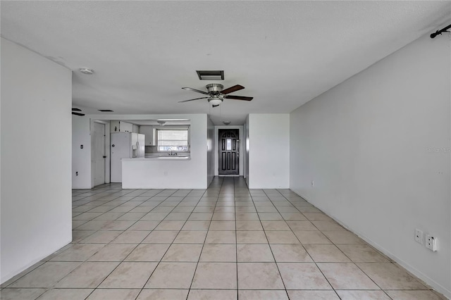 7810 Pineapple Ln, Port Richey, FL 34668 - unfurnished living room featuring ceiling fan, a sink, and light tile patterned flooring