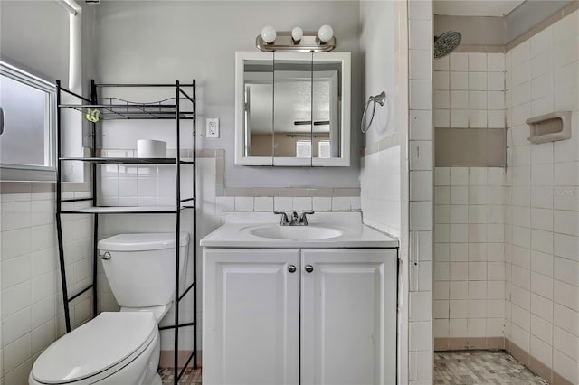 7810 Pineapple Ln, Port Richey, FL 34668 - bathroom with tile walls, a tile shower, toilet, and vanity