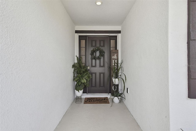 12517 Nantahala Run, Parrish, FL 34219 - view of exterior entry featuring stucco siding